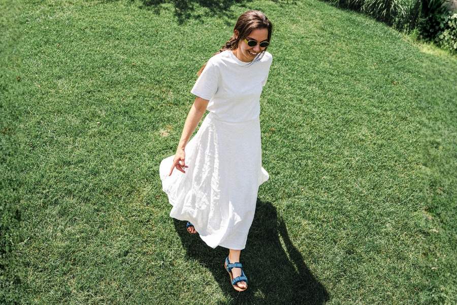 Women's barefoot sandals worn with a summer skirt Women's barefoot sandals worn with a summer skirt