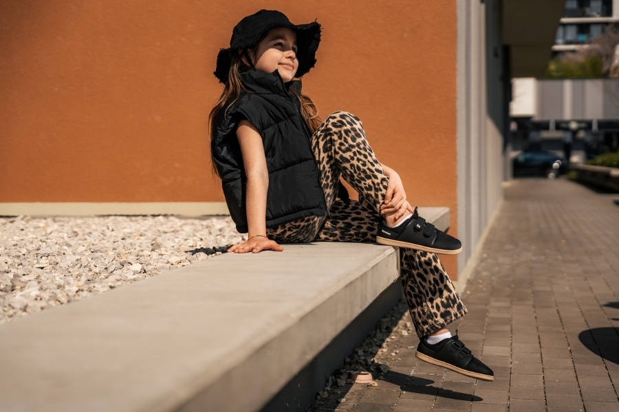 Kids' spring barefoot sneakers in a city outfit Kids' spring barefoot sneakers in a city outfit