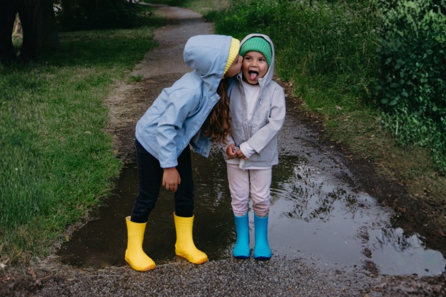 Kids' barefoot rain boots on a wet fall day Kids' barefoot rain boots on a wet fall day