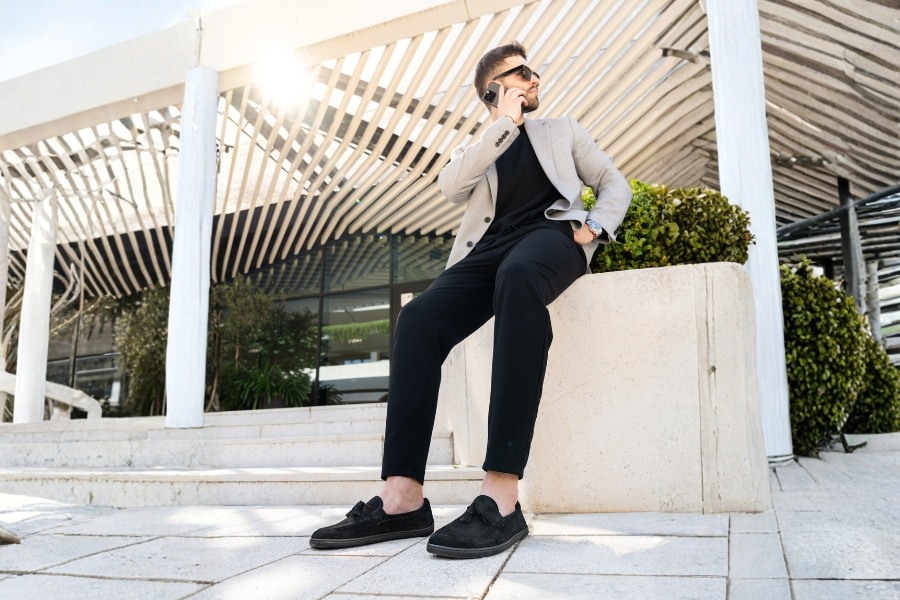 Black suede men's barefoot loafers worn with a blazer Black suede men's barefoot loafers worn with a blazer