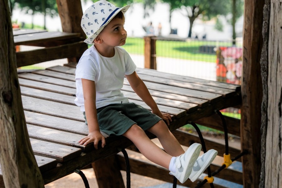 Kids' vegan barefoot sneakers at the playground Kids' vegan barefoot sneakers at the playground